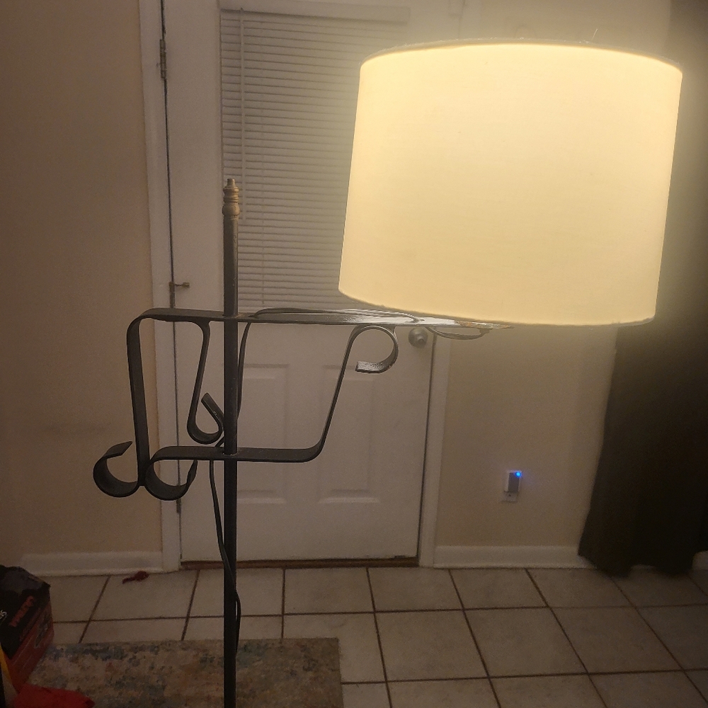 Antique wrought iron floor lamp